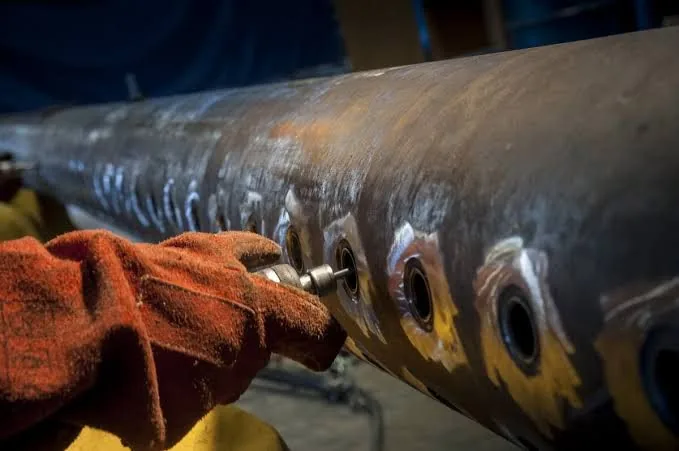Detailed close-up of pressure equipment component work