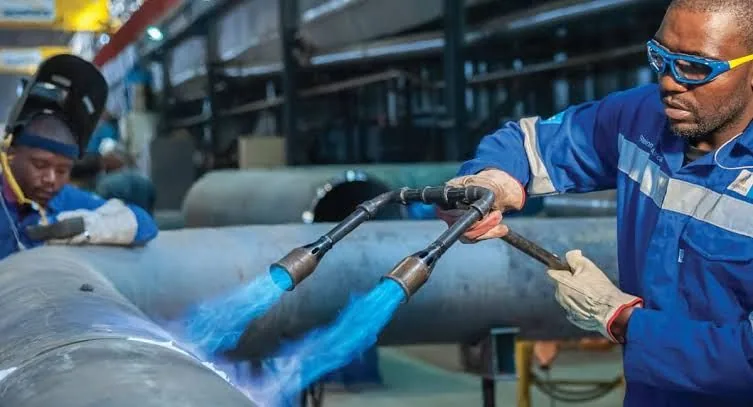 Industrial welding and fabrication in workshop environment